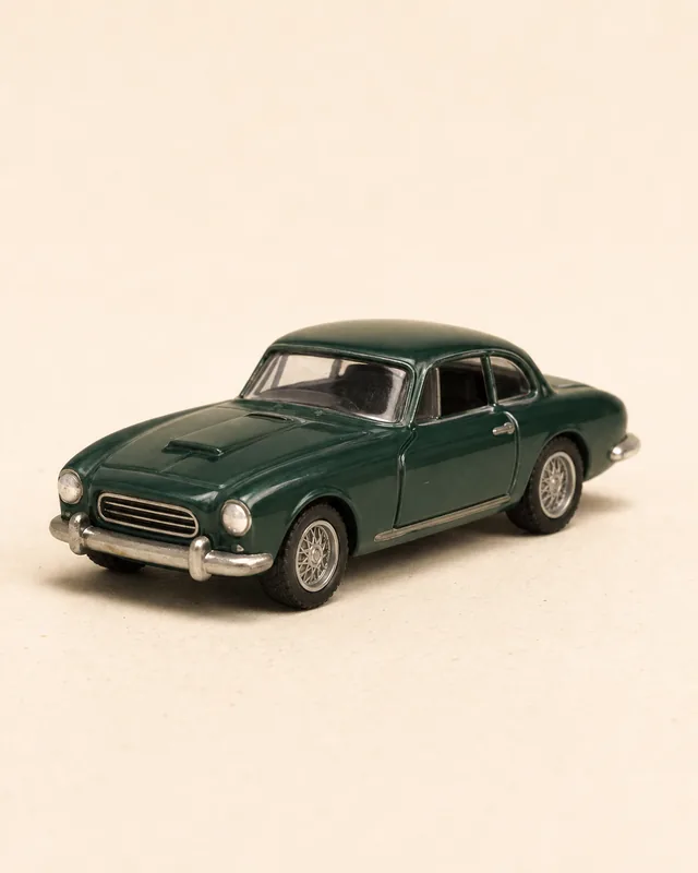 Dark green vintage die-cast coupe model